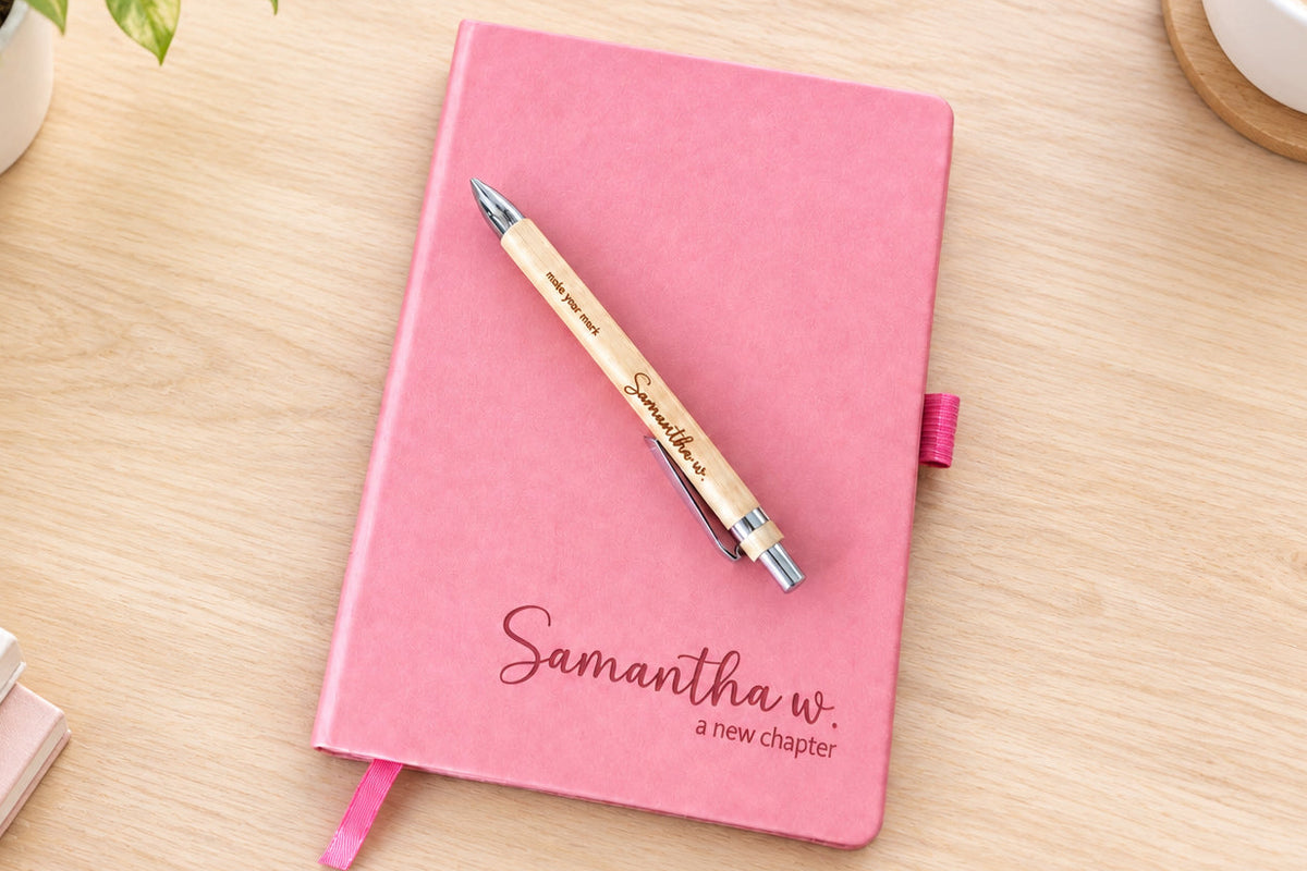 Personalized leatherette journal and pen example for YJune Studio live engraving.
