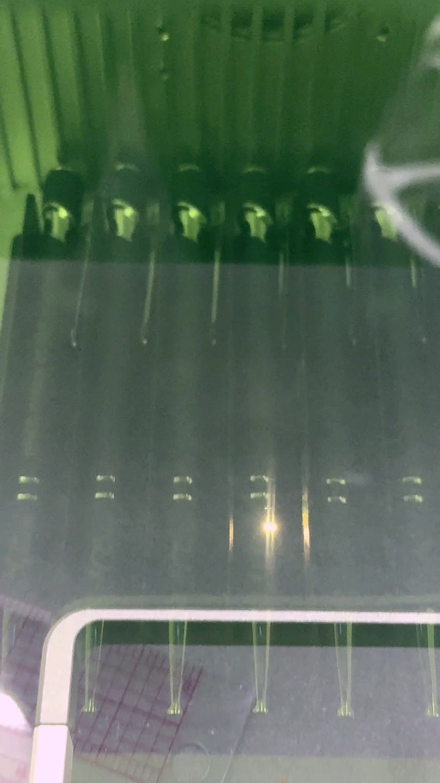 Laser engraving personalized pens in progress at YJune Studio.