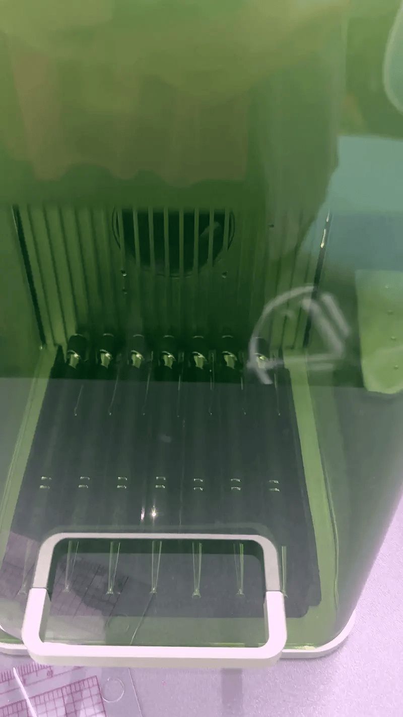 Laser engraving personalized pens in progress at YJune Studio.